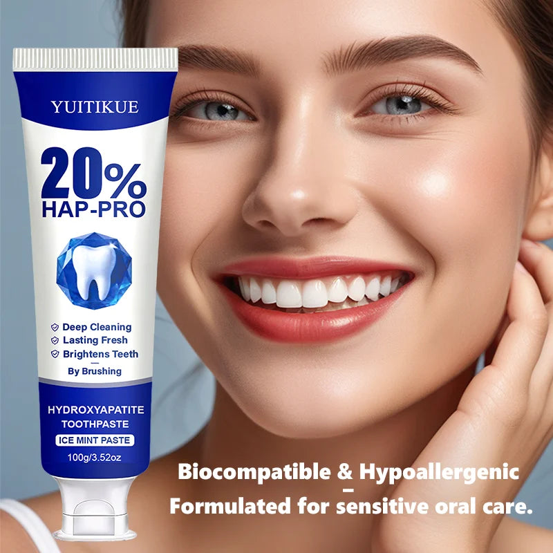 Hydroxyapatite toothpaste tube with smile and tooth care graphics
