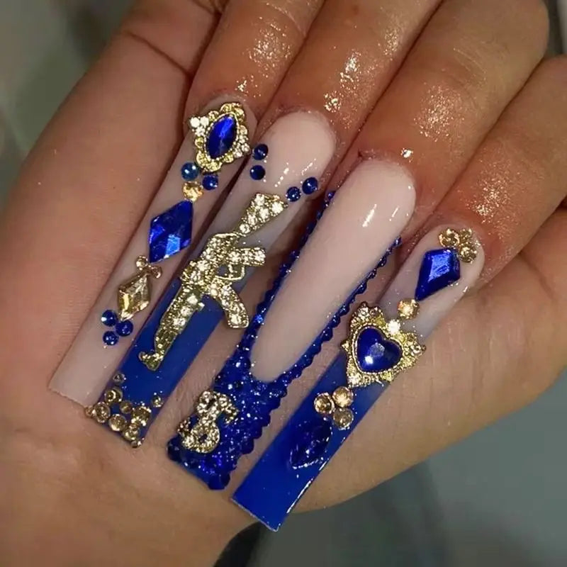 Long decorated nail designs shown on hands