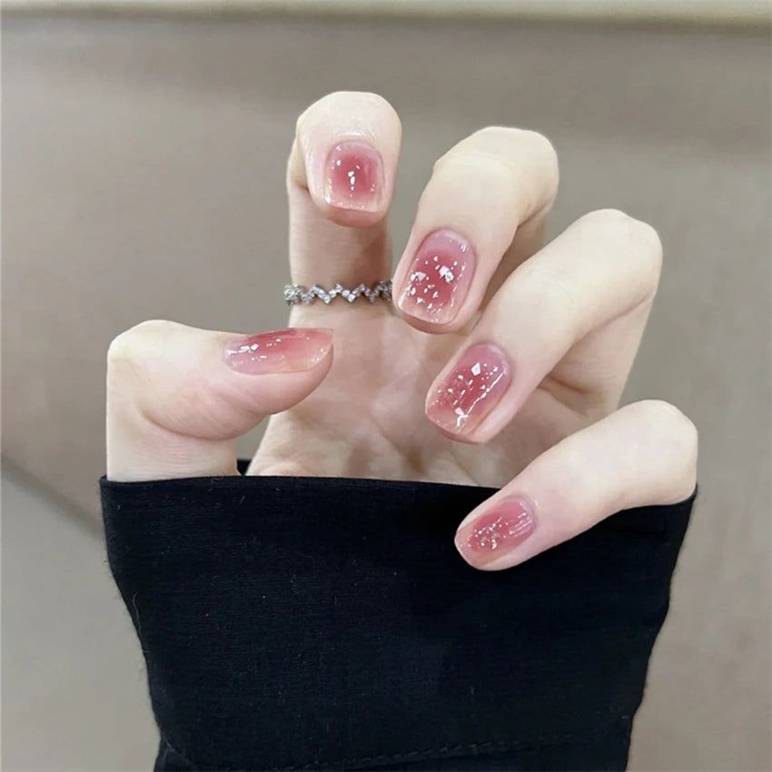 Decorated nail designs shown on hands