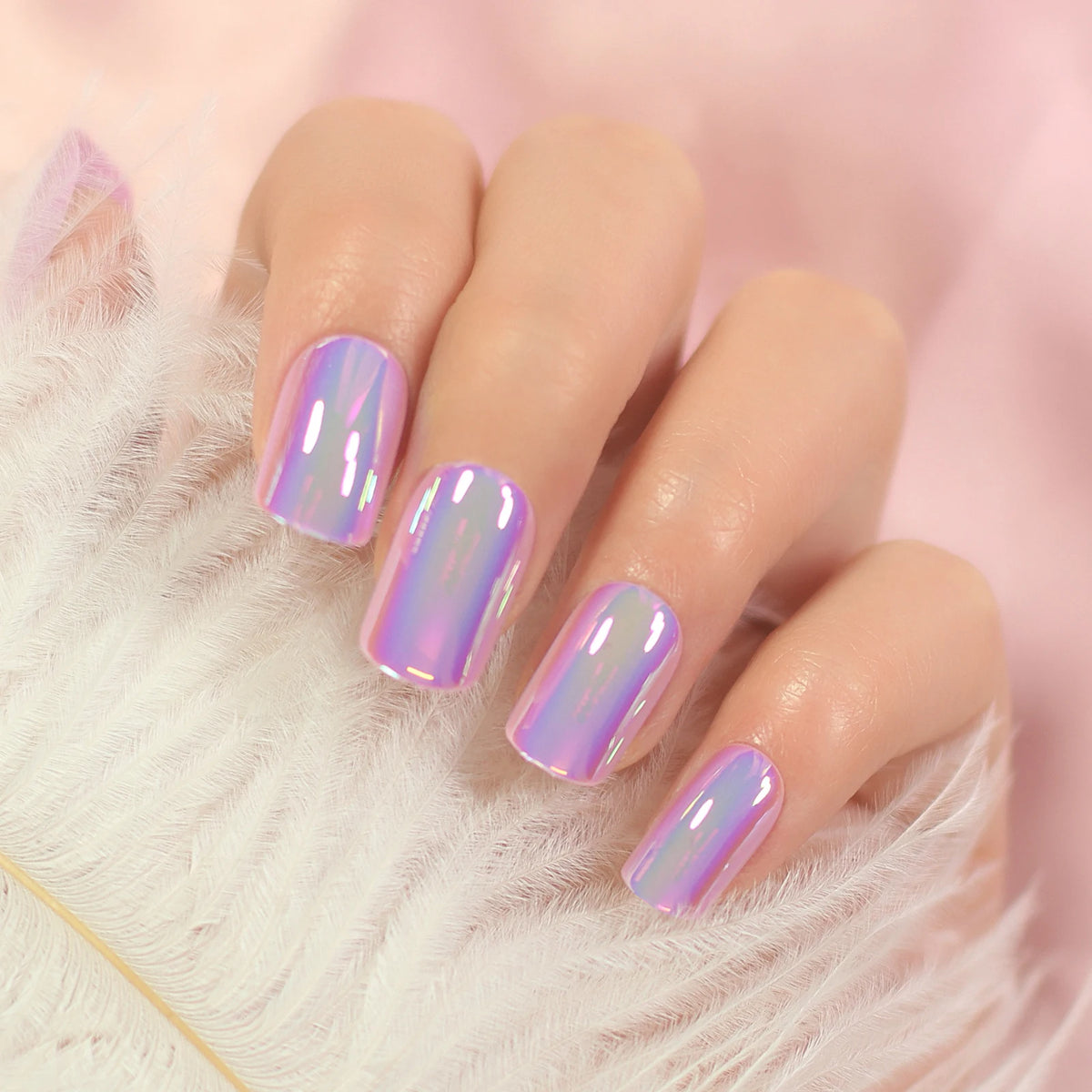 Chrome-finish nails shown on hands