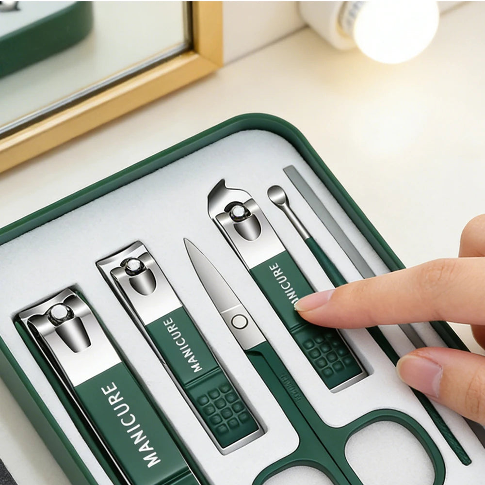 Manicure tools in a green case with nail clipper detail views