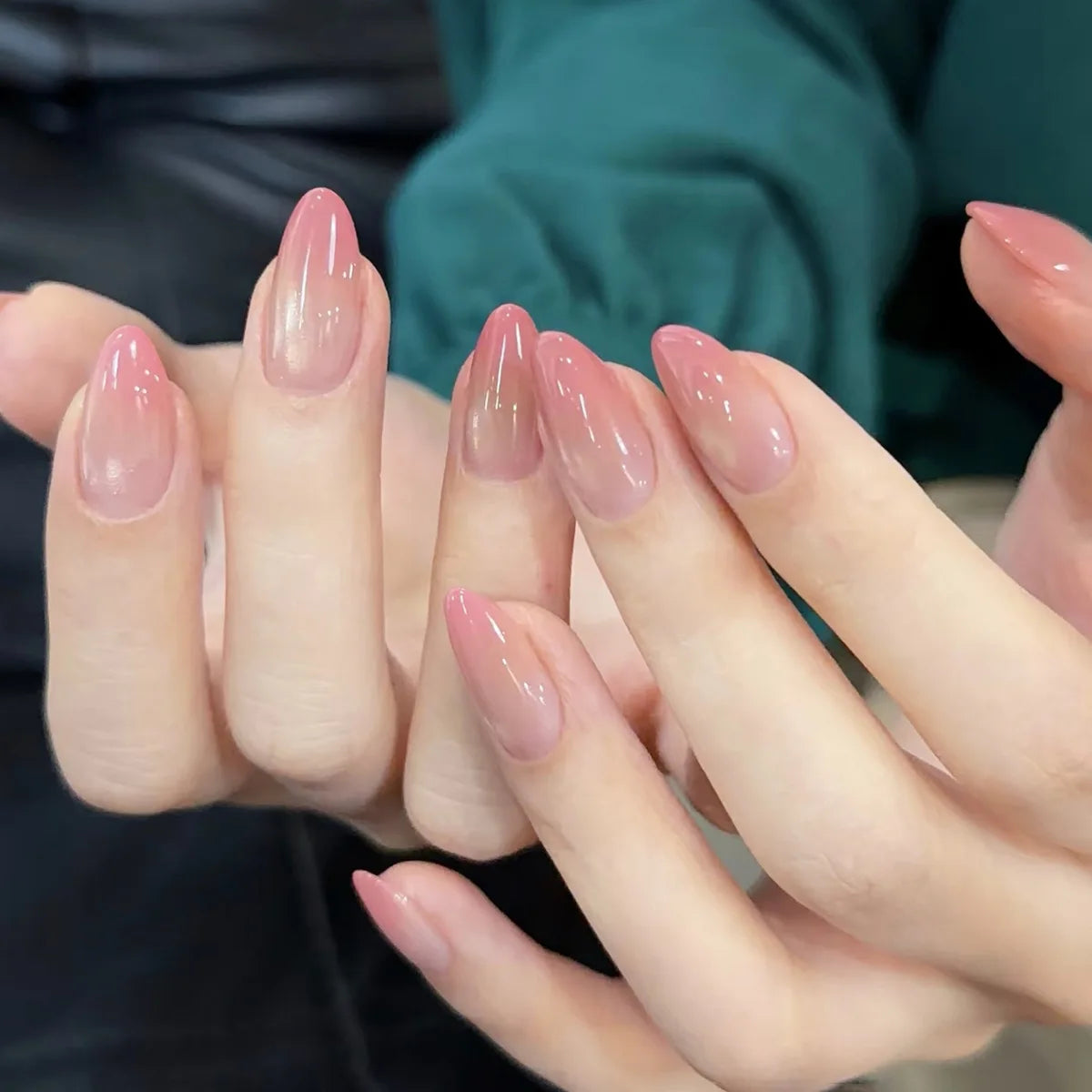 Decorated nail designs shown on hands