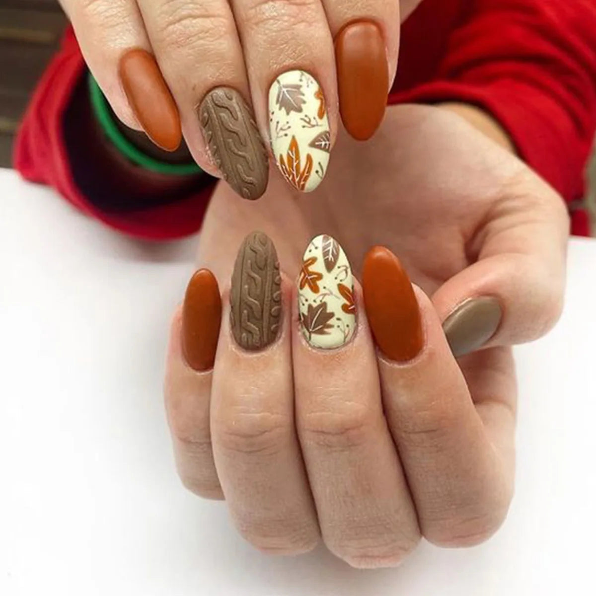 Decorative nail designs shown on hands