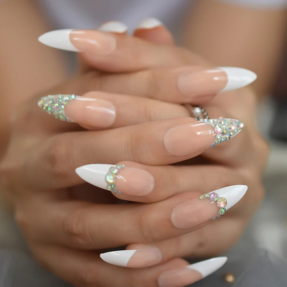 Rhinestone-decorated nail designs shown on hands