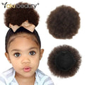 Curly puff hairpiece with styled hair or base details