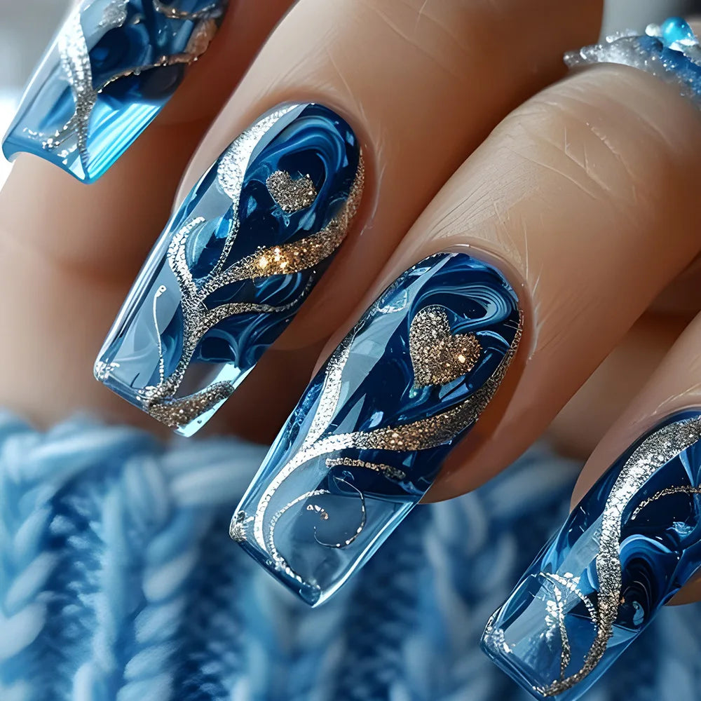 Colorful marine and summer-themed nail designs shown on hands
