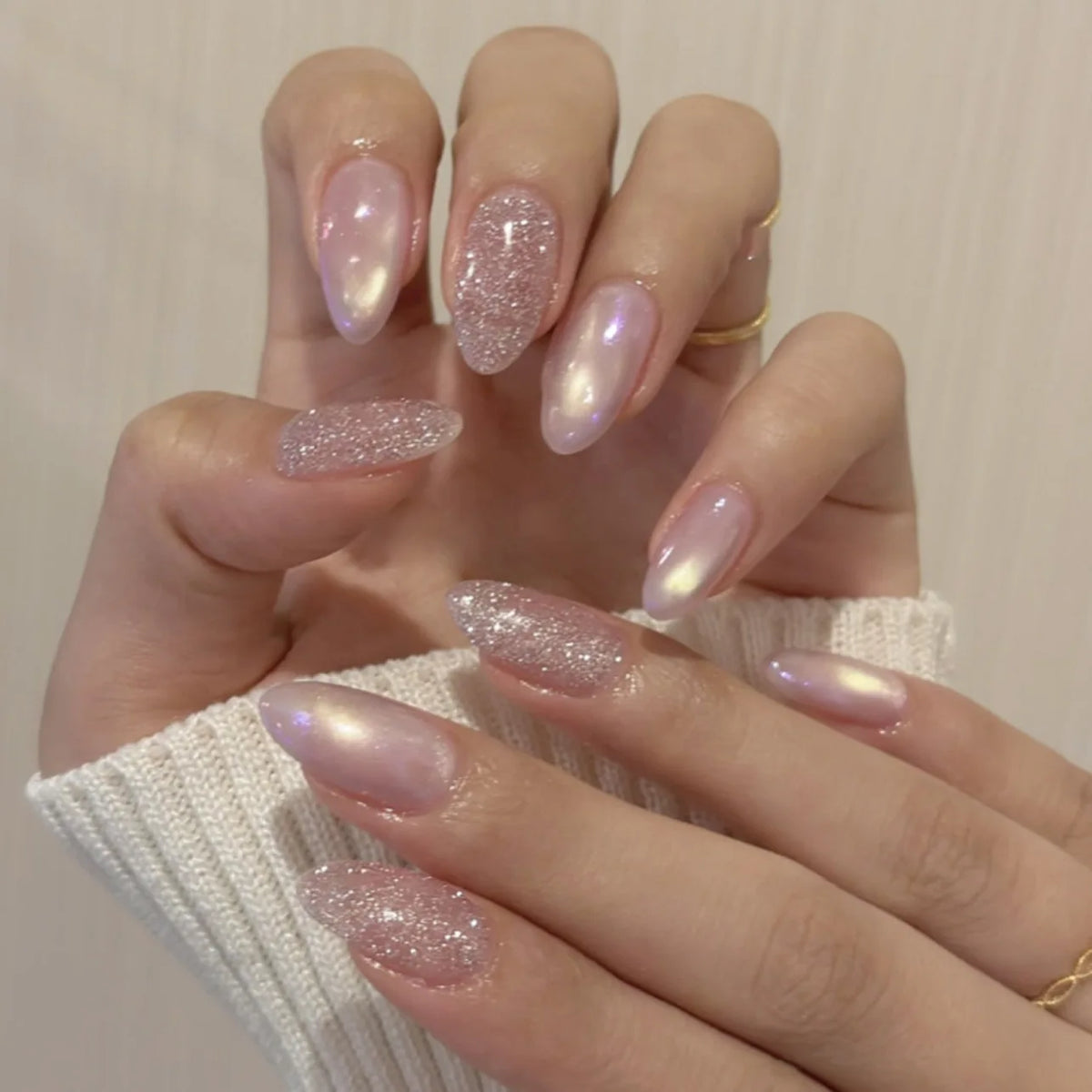 Decorated nail designs shown on hands