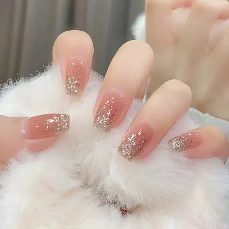 Decorated nail designs shown on hands