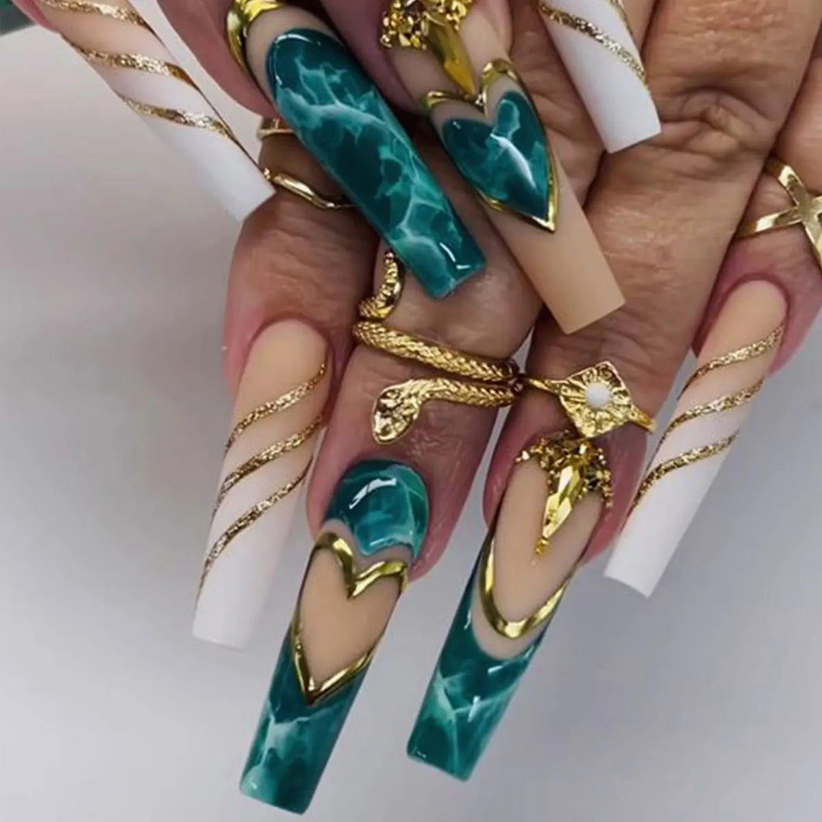 Decorative nail designs shown on hands