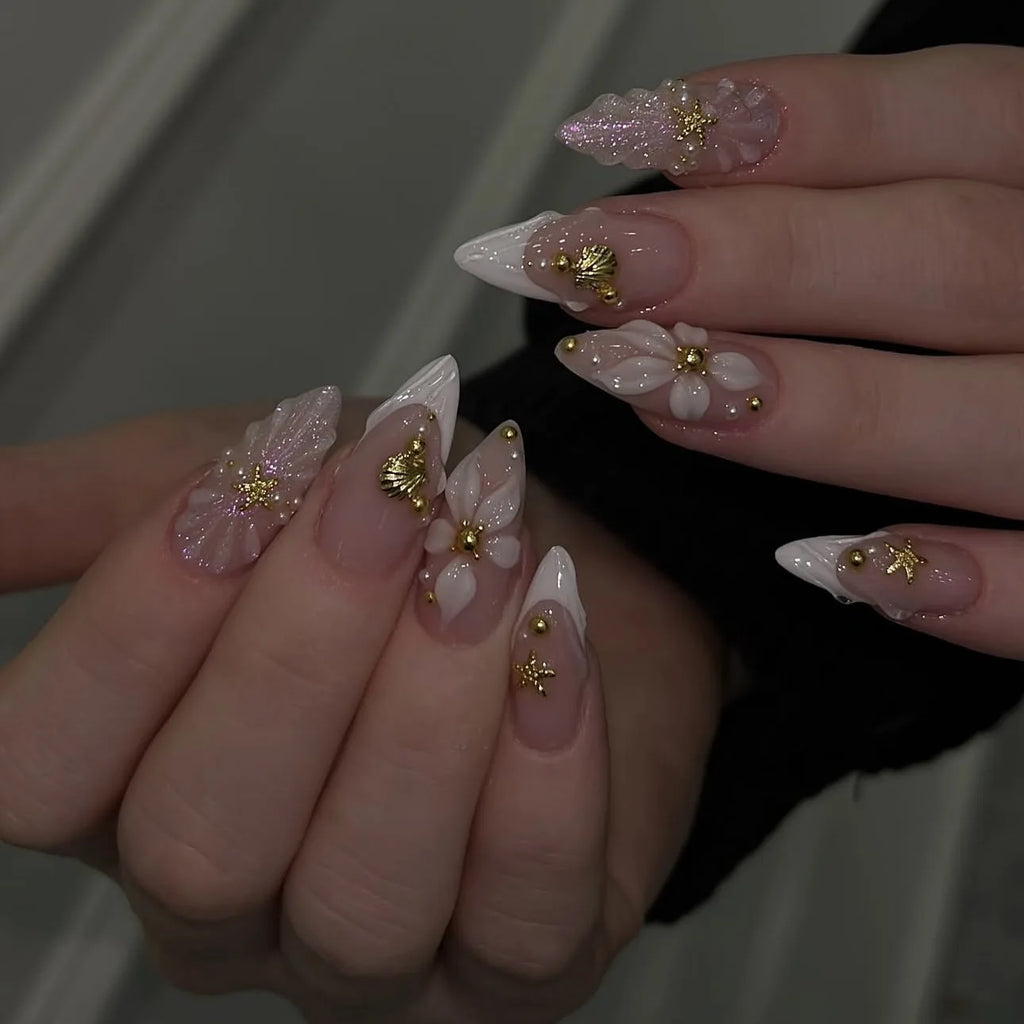Decorated nails shown on hands