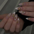 Decorated nails shown on hands