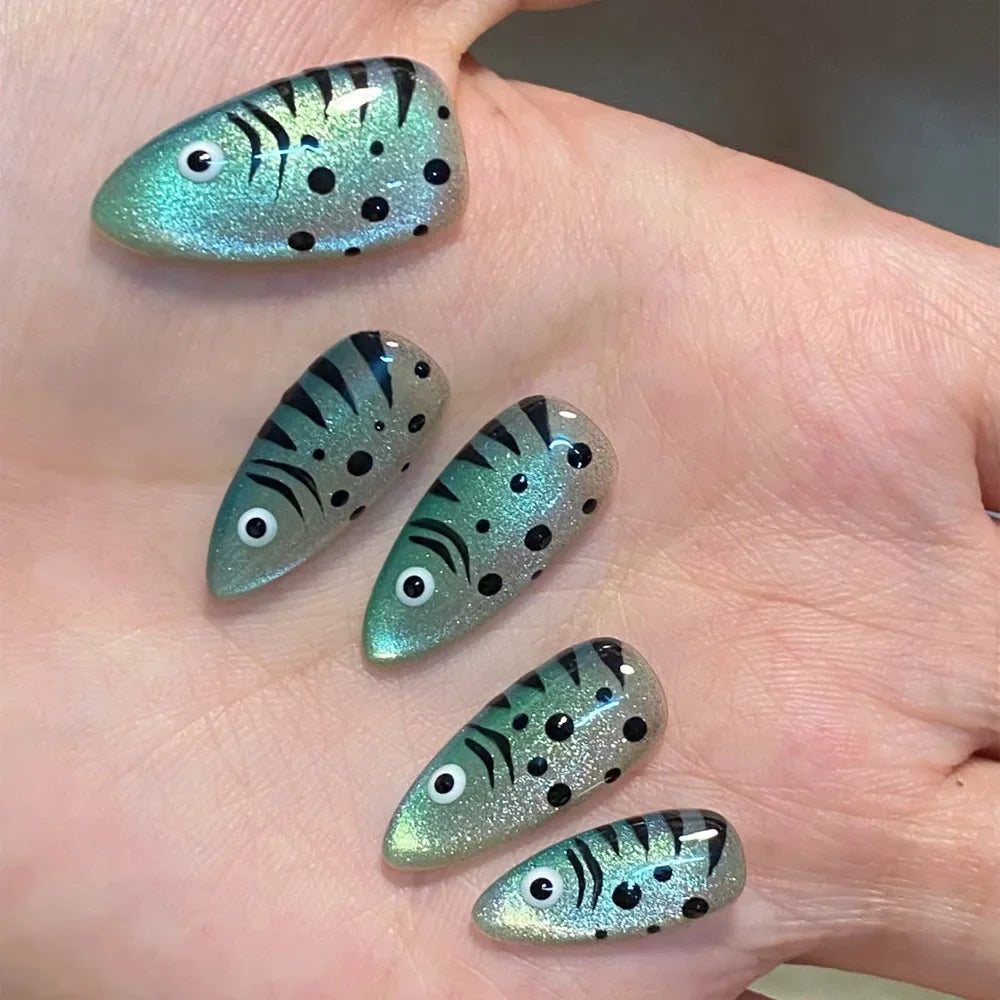 Decorative nail designs shown on hands