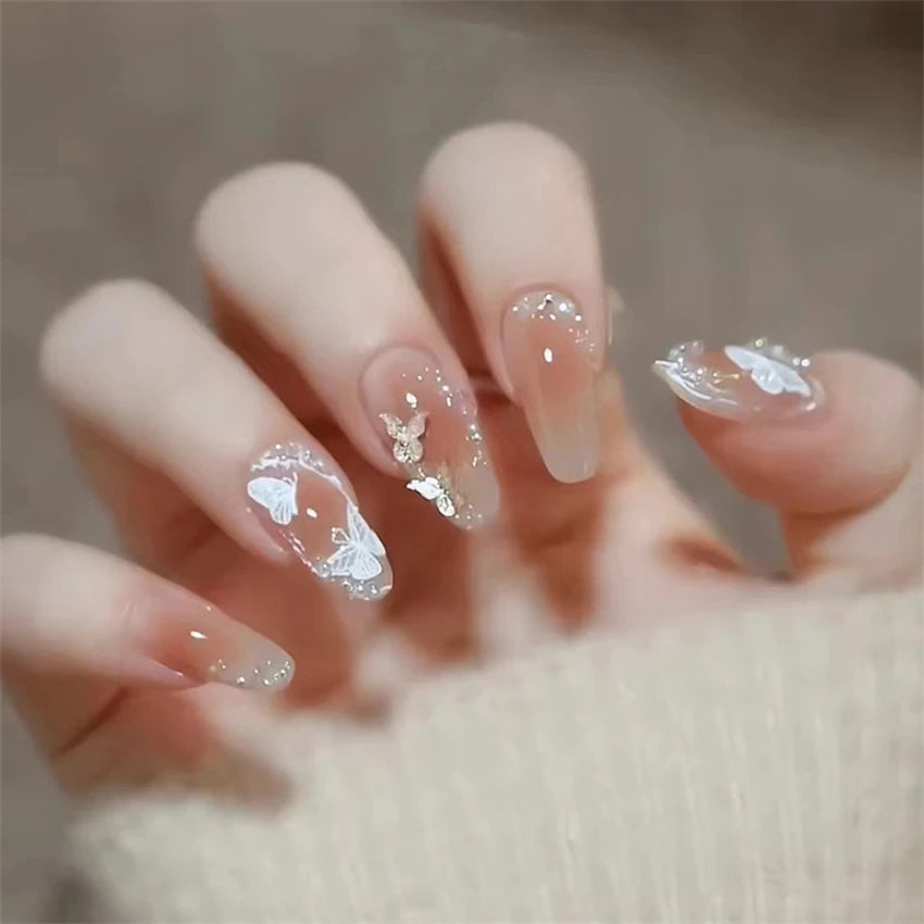 Decorated nail designs shown on hands