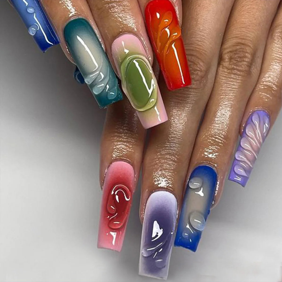 Decorative nail designs shown on hands