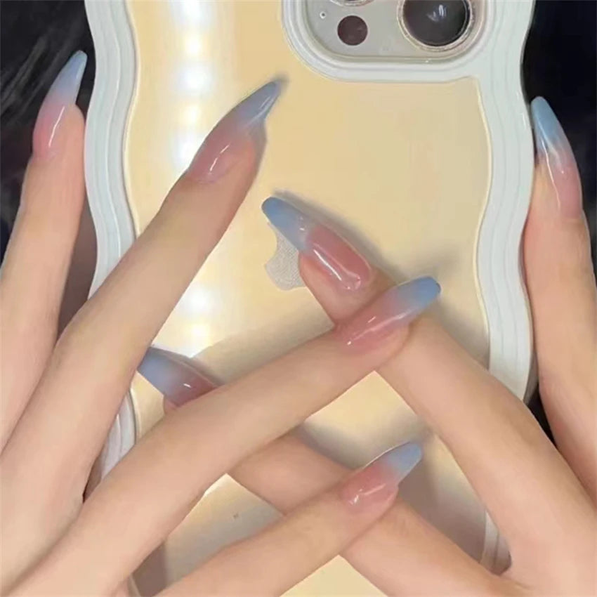 Decorated nail designs shown on hands