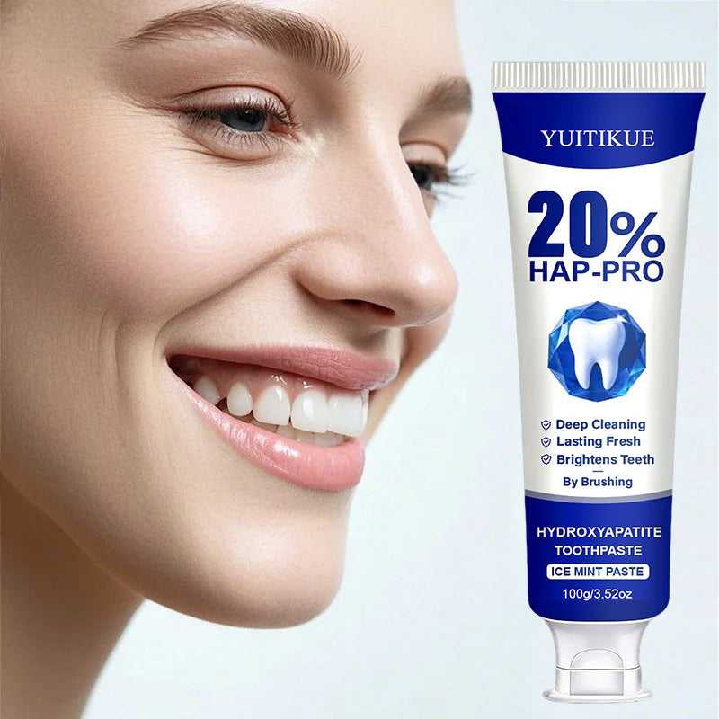 Hydroxyapatite toothpaste tube with smile and tooth care graphics