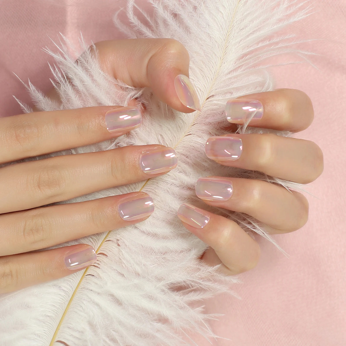 Chrome-finish nails shown on hands