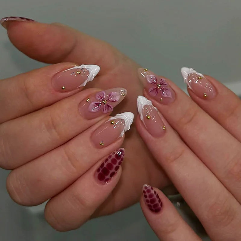 Decorated nails shown on hands