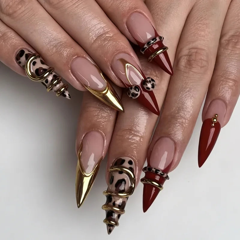 Long decorative nail designs with raised embellishments shown on hands