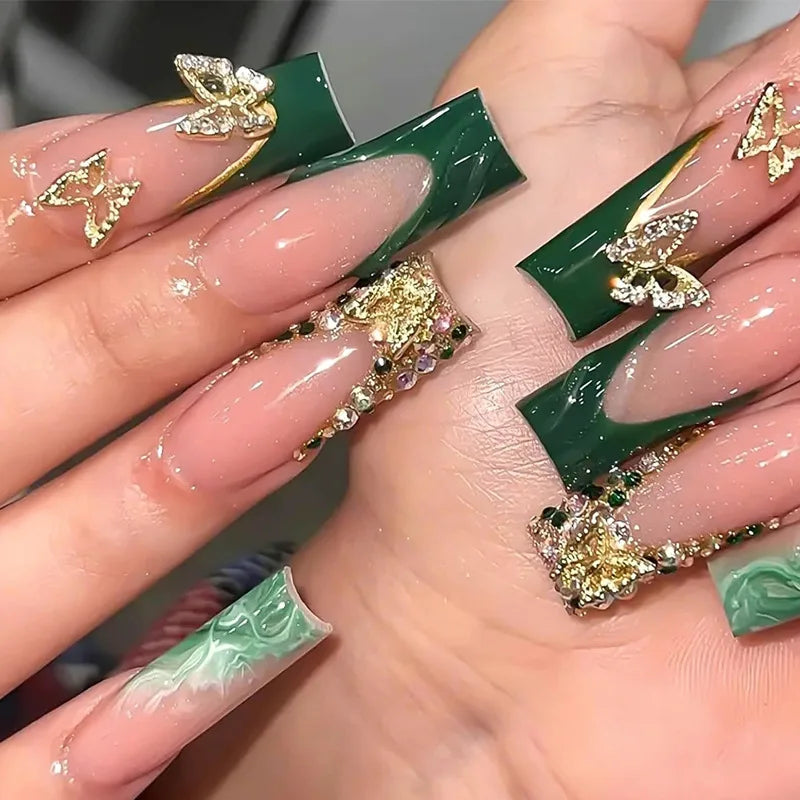 Decorated nail designs shown on hands