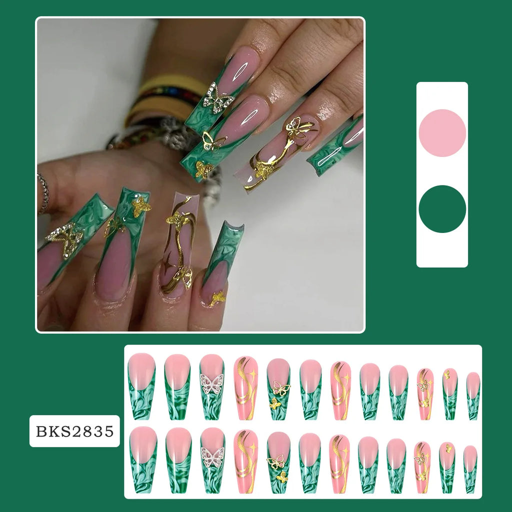 Green decorative press-on nail set with manicure example