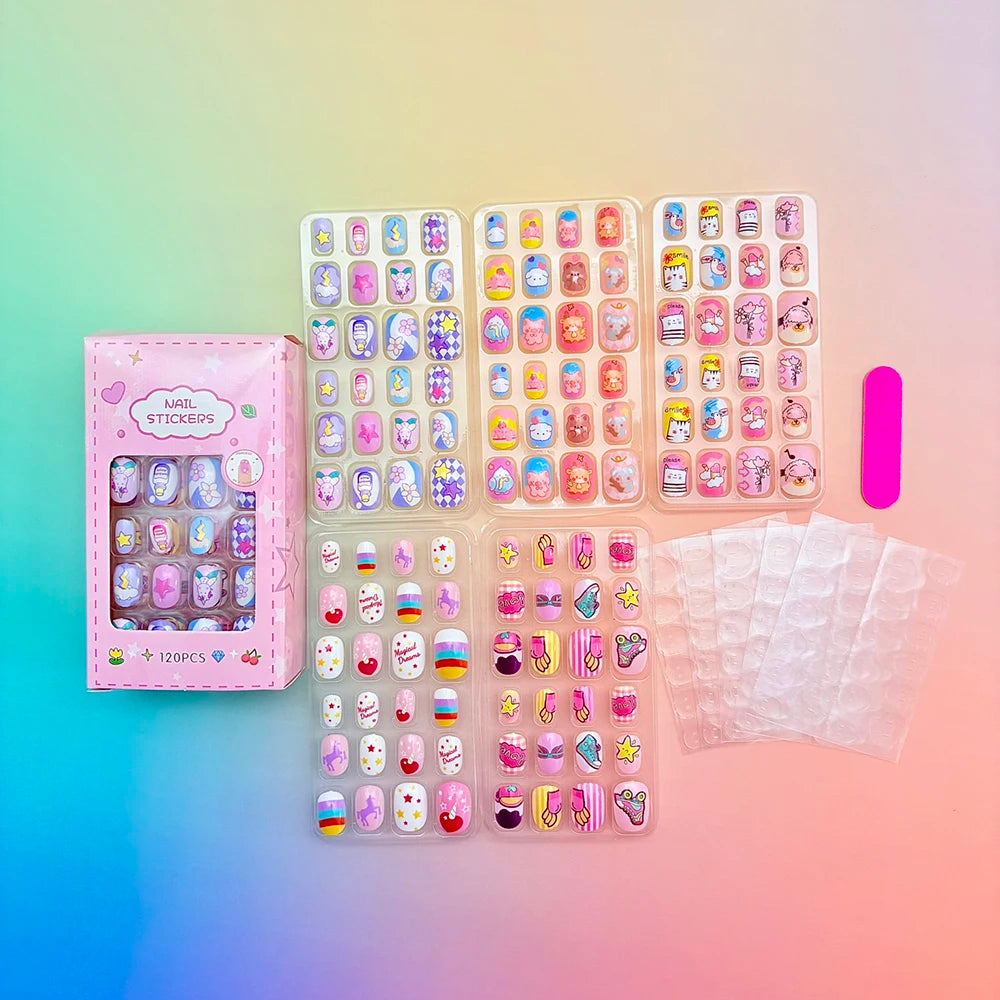 Assorted colorful press-on nails with packaging and manicure accessories