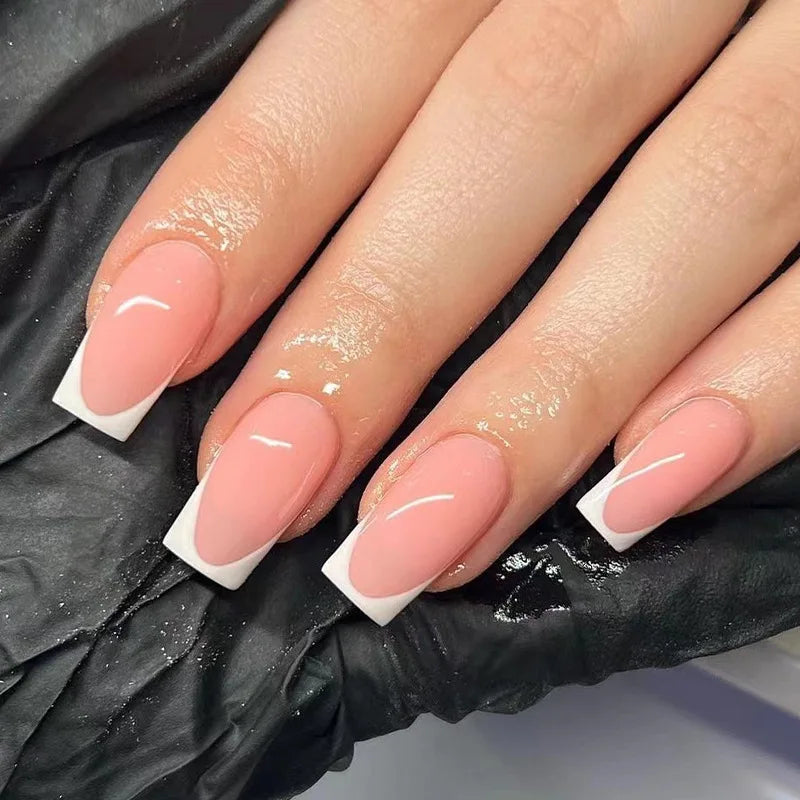 Decorated nail designs shown on hands