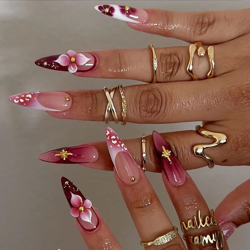 Metallic and embellished nails shown on hands