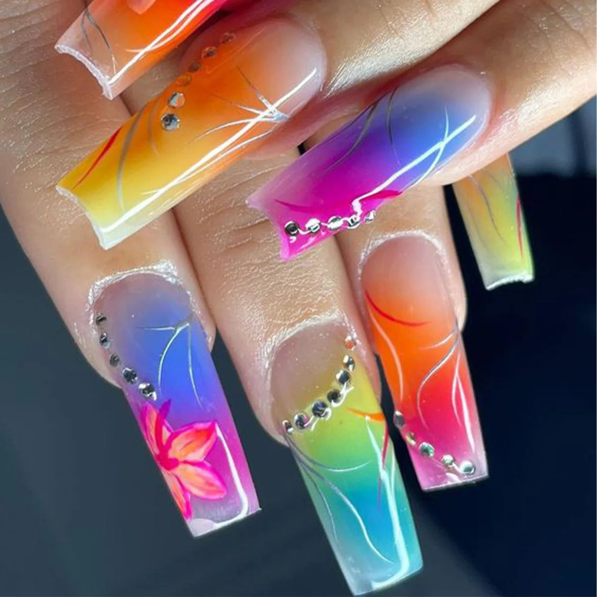 Decorative nail designs shown on hands