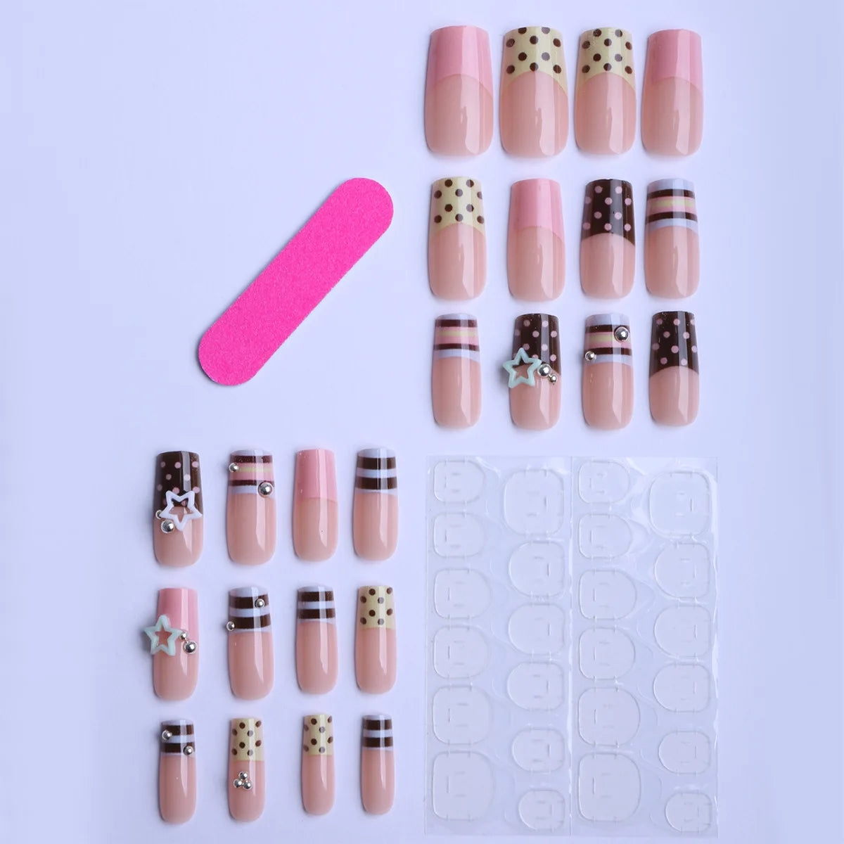 Short decorated press-on nails arranged in rows