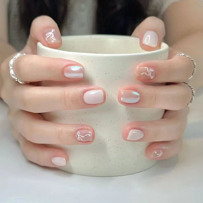 Decorated nail designs shown on hands