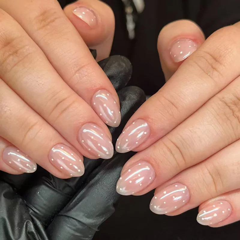 Decorated nails shown on hands