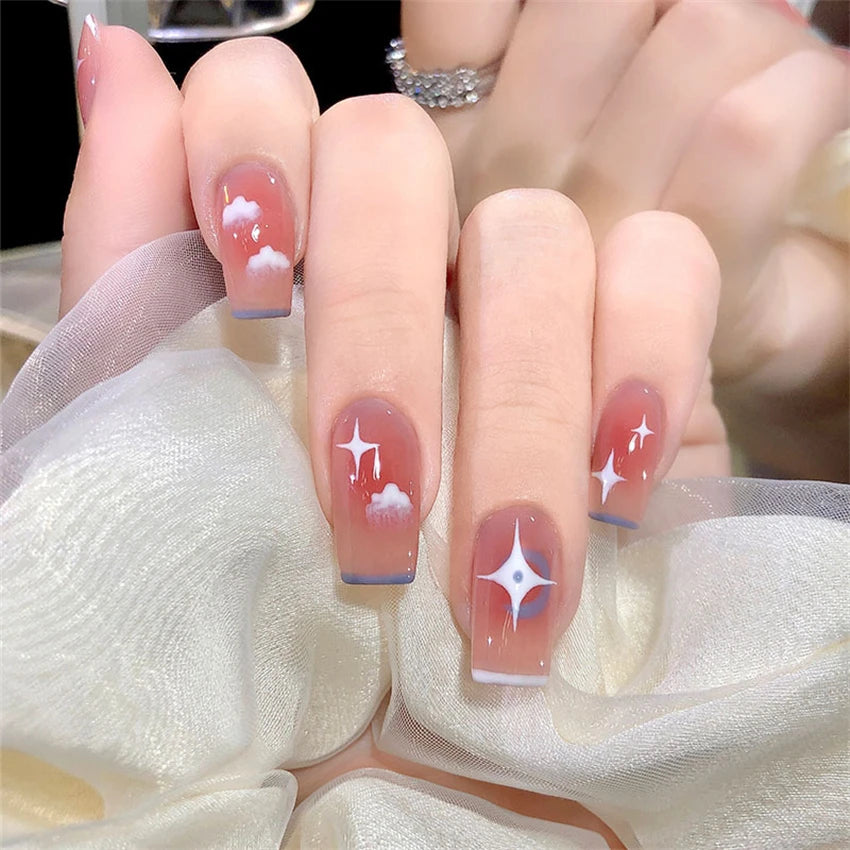 Decorated nail designs shown on hands