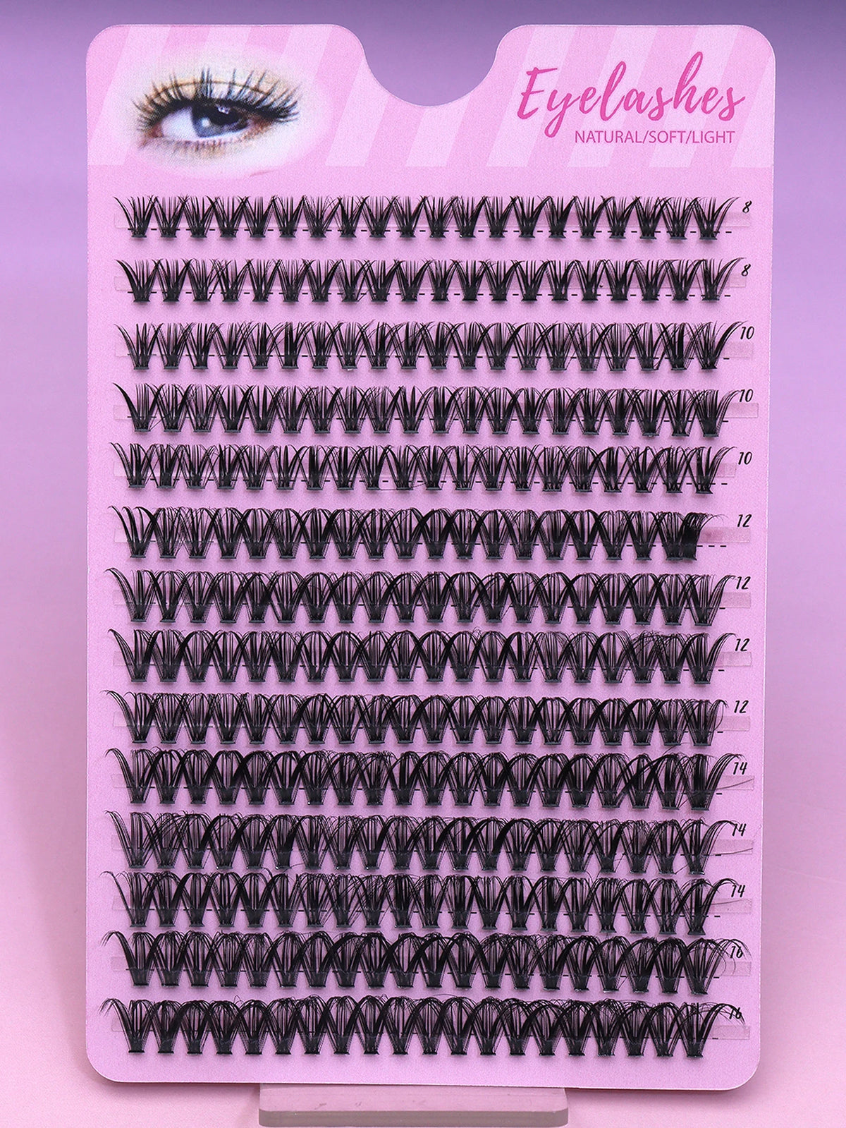 False eyelash clusters arranged in rows in a tray