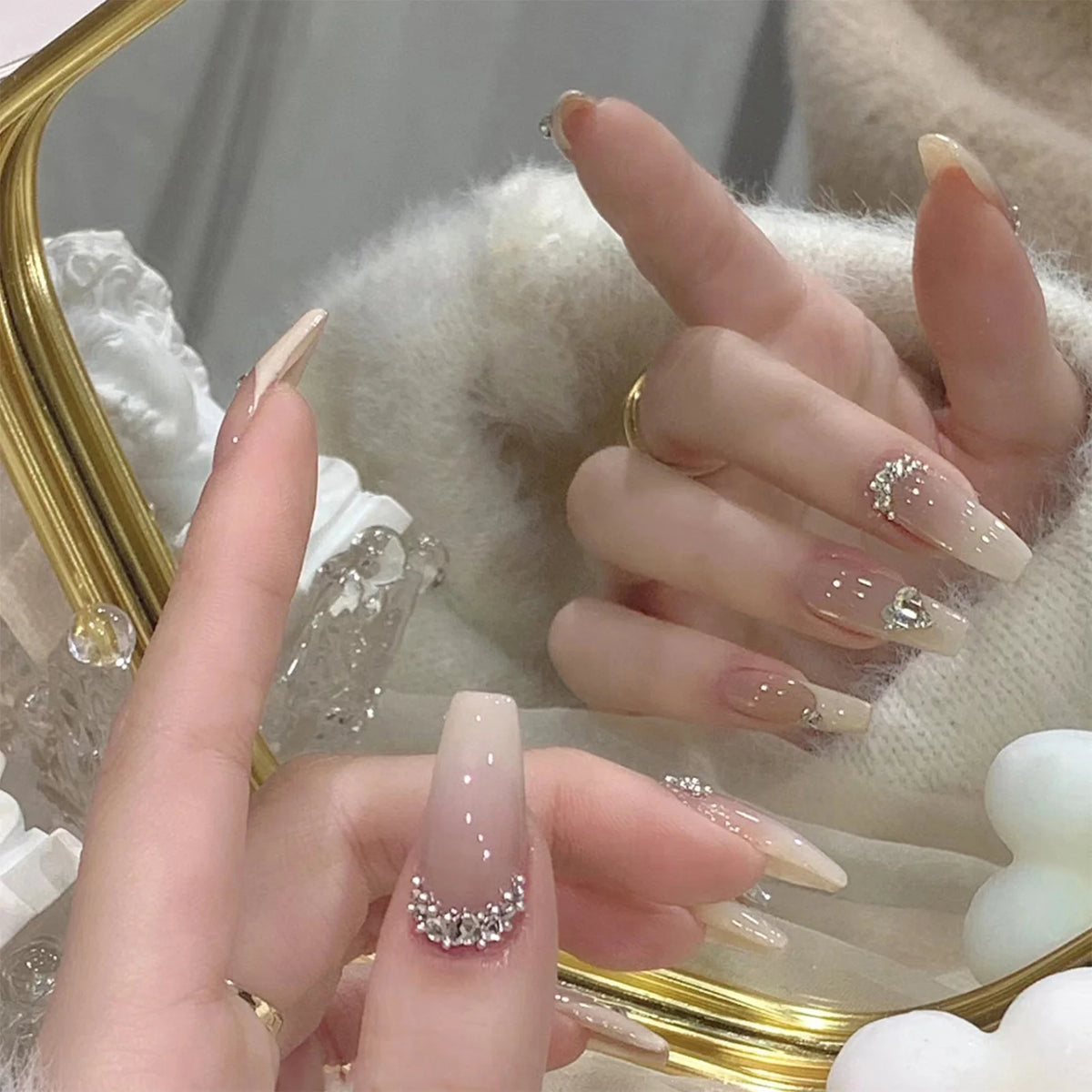Translucent decorated nails shown on a hand