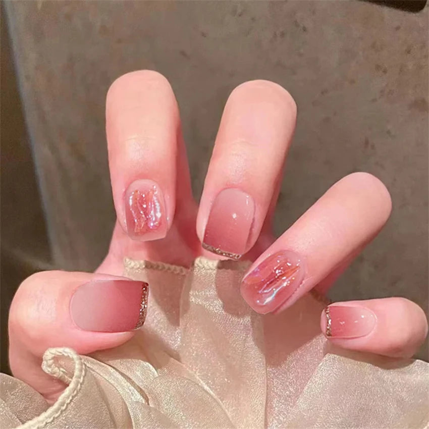 Decorated nail designs shown on hands