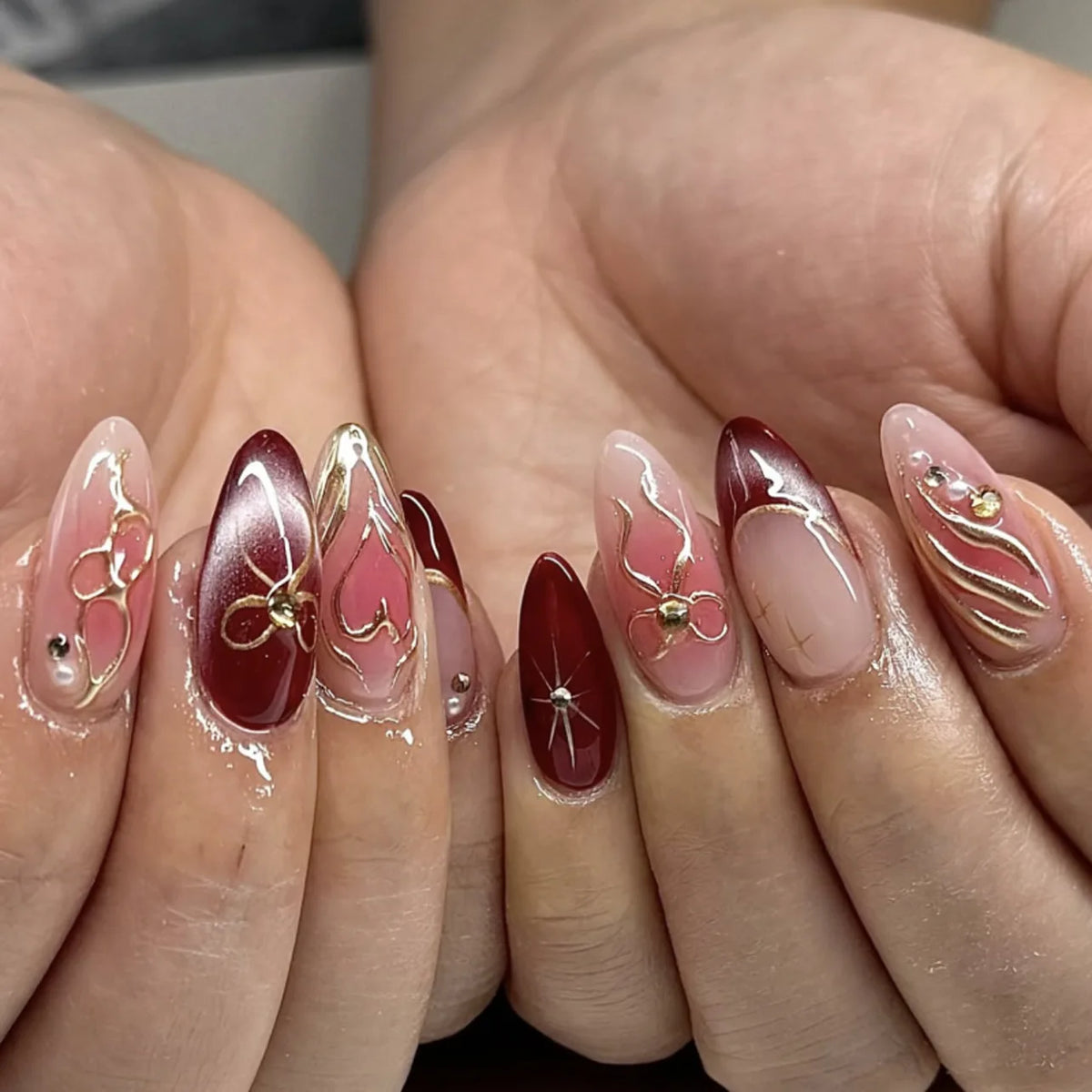 Decorated nails shown on hands
