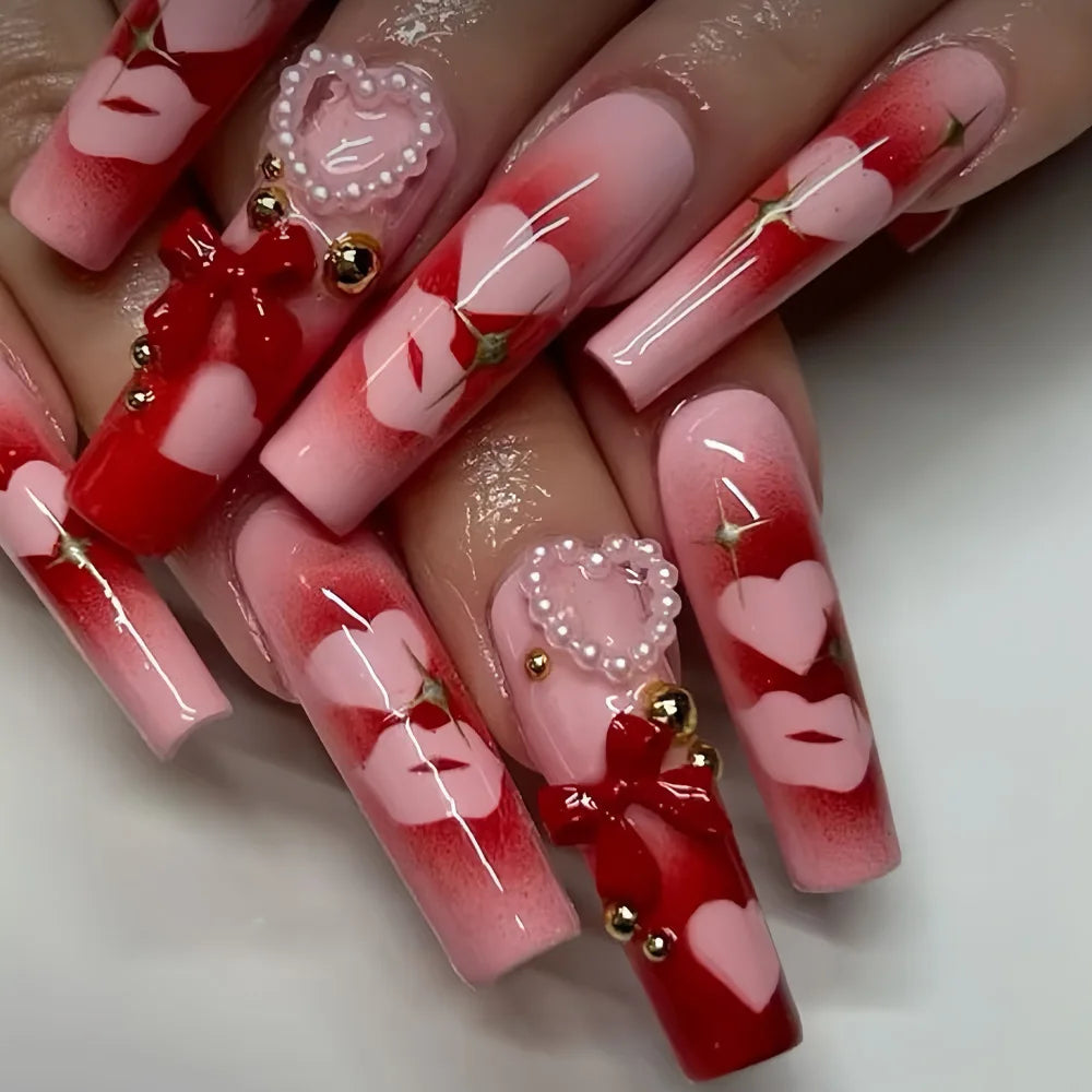Long decorated nails with raised embellishments shown on hands